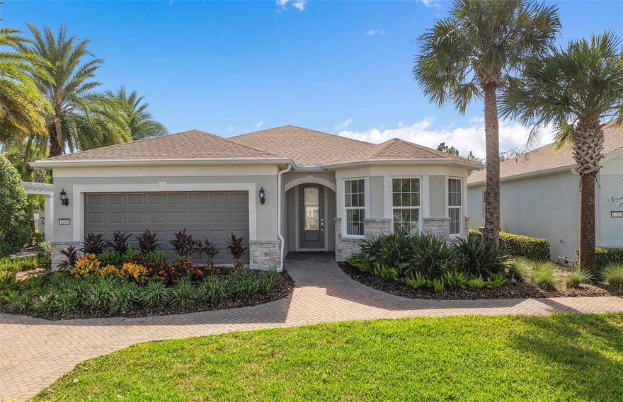 Under Construction. Del Webb Sunbridge is a gated 55+ active adult natural gas community offering new construction single family and villa homes with a low-maintenance lifestyle – and a Central Florida location in the center of it all. Del Webb Sunbridge offers an abundance of resort-style amenities with social events and activities centered in the 27,000-square foot clubhouse and planned by a full-time Lifestyle Director. With a zero-entry pool with lap lanes, resistance pool, poolside hammocks, and heated spa, sports courts, a movement studio, walking trails and more. Meet new friends at a resident club, take a painting class at one of the many art studios, attend a concert or show at the amphitheater, grab a bite at the on-site tavern & grille, or chat at the fire pits and grille pavilion. Get spoiled at Del Webb Sunbridge - after all, this is your time! Your home's exterior and yard maintenance are included, and fiber network provides up to gigabit internet speed. Del Webb Sunbridge’s resort amenities, sports courts, and Lifestyle Director with nearby Lake Nona truly make this the ideal neighborhood and a perfect location to call home.
Step into the Mystique Model Home by Pulte! Originally a model home, this stunning one-story 3 bedroom, 2 bathroom, open flex room, and 2-car garage masterpiece boasts a pool situated on a homesite with no rear neighbors, a privacy wall at the rear of the home, and black aluminum fencing–offering both privacy and beauty. The open-concept layout seamlessly connects the gourmet kitchen, café, and gathering room, creating an airy atmosphere. The many windows bathe the entire space in natural light, while the tray ceiling in the gathering room adds an extra touch of sophistication, elevating the overall feeling of openness. The gourmet kitchen is a true focal point, featuring Whirlpool appliances, including a natural gas cooktop and French door refrigerator. Soft-close cabinetry, a range hood, mosaic tile backsplash, quartz countertops, and under-cabinet lighting add the perfect blend of style and convenience. The kitchen flows effortlessly into the café and gathering room, where a zero-corner sliding glass door leads to the extended covered lanai and pool, making this home ideal for seamless indoor-outdoor living. Retreat to the luxurious owner’s suite, a serene sanctuary with a spacious walk-in closet and a spa-like en suite bathroom. Dual vanity sinks, a walk-in shower, an enclosed toilet, and a linen closet complete the tranquil space. The two additional spare bedrooms and bathroom, along with the open flex room, provide ample space for family and guests. The upgraded laundry room with built-in cabinetry, quartz countertops, utility sink, and Whirlpool washer and dryer make daily tasks a breeze. Every detail of this home has been carefully curated, from the Shaw wood-look luxury vinyl plank flooring throughout to the tile flooring in the bathrooms and laundry. Designer-curated finishes elevate every corner of this home, including brushed nickel hardware and plumbing fixtures, 8’ interior doors, comfort-height toilets, and epoxy finish on the garage floor. With its stunning design and thoughtful touches, the Mystique home provides the perfect blend of luxury and functionality for today’s lifestyle. Don't miss out on your chance to own one of the best homes in the neighborhood! Schedule a tour today!