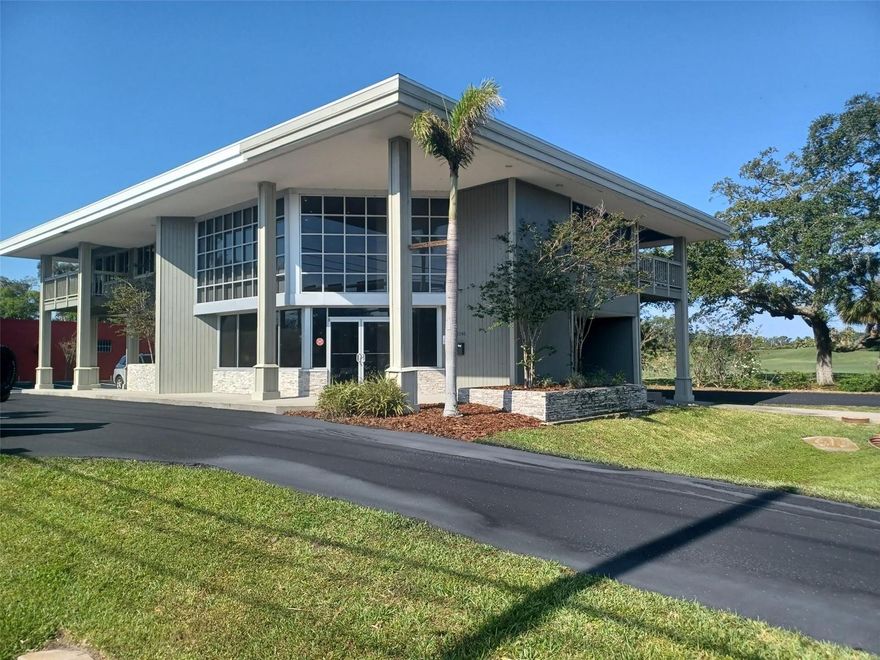 Fantastic office building with spectacular views of the golf course from the 2nd floor. Beautiful lobby entrance with artistic stone wall. First floor offers large open, 3 separate offices, a large conference room, 2 bathrooms, and a kitchen. A utility closet with a/c units, a storage closet and a smaller office supplies closet. Rear entrance. 2nd floor with Large open area, 5 separate offices, conference room, large kitchen with adjacent balcony. 2 bathrooms, a utility room with a/c unit, and additional storage closets. The parking lot just resurfaced, May 2023 and relined with 13 parking spaces and to under building parking spaces,  roof was replaced in 2015, over 5,300 heated square feet- total sq footage of the building is 7,563 sq. ft, 3 zones a/c, emergency lighting and security system.  2nd floor has 2 covered balconies. Perfect professional building for doctor,  attorney, insurance, etc.