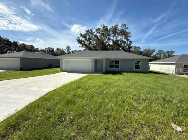 One or more photo(s) has been virtually staged. MOVE IN READY HOME WITH BRAND NEW PAVED ROADS THROUGH SUBDIVISION!! Beautiful new construction 3 bedroom 2 bath home! Luxury Plank Vinyl flooring throughout all living and common areas, tile in bathrooms, and carpet in the bedrooms. Open floor plan with dining area and eat-in kitchen, all done in neutral, pleasing colors. Walk-in closet in Master bedroom and vanity in master bath. Stainless steel appliance package in the kitchen. Cabinets are white shaker-style with light luxury granite countertops. Please see attached documents from Builder (Builders Contract Addendum & Warranty) Actual photos and virtually staged model home photos both attached for reference. Information is deemed correct, but no guarantee made. Any dimensions listed are approximate. ***Inquire about our preferred lender deals! Builder offering to contribute to buyer’s closing costs or help with rate buy downs! We can be flexible to help our buyers get into a beautiful home!