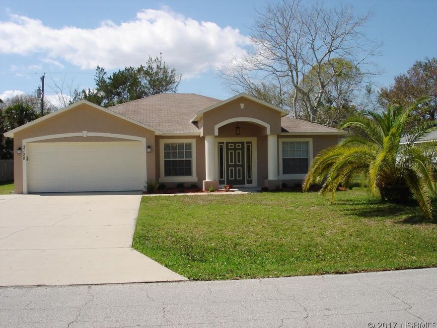 Freshly painted inside and out. Built in 2003, this solid concrete block 3/2, 2 car garage home is move in ready. New carpeting in all bedrooms, great room, living and dining rooms. Vinyl flooring in kitchen and  laundry room off kitchen. Brand-new stainless steel appliances; brand-new washer and dryer. Quality ceiling fans with light fixtures in every room. Master bedroom features a walk-in closet and bathroom with double sinks and step-in shower. Bright and airy with plenty of living space; truly Florida living. ;Water: City