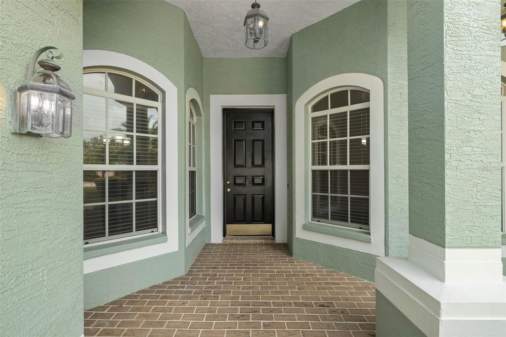 Photo of 10136 Kingsbridge Avenue, Tampa, FL 33626 (MLS # TB8434643)