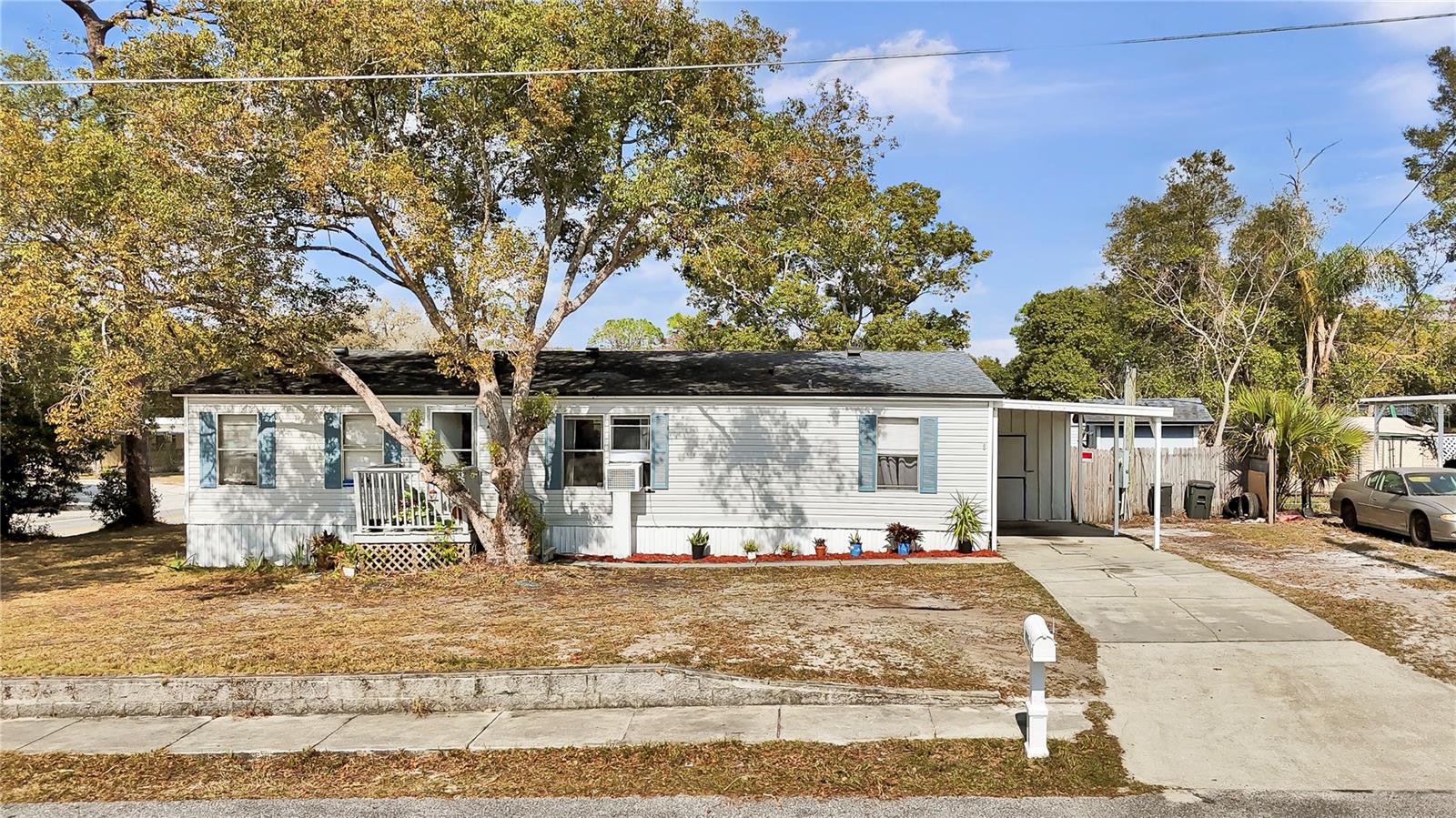 Location, Location, Location, and very well maintained, Clean, Manufactured Home on a private CORNER lot away from HOA or lot fees. Partially fenced, in a well-established neighborhood in Casselberry. A great starter home for the first-time home buyer or the part-time snowbird. Has extra concrete driveway for RV or extra vehicles. Storage shed attached to carport. Cover deck on the back. A nice-sized yard that overlooks a wooded conservation area. The Master has a walk-in closet and private bath. The living room is spacious and boasts an open floor plan. The kitchen opens to the family room. The crawl space is fully sealed and treated for rodents and pests. City water and city sewer. All appliances, washer and dryer included. Move in Ready! Great location, with Seminole County schools, banks, medical centers, shopping, and restaurants. Easy access to major highways. Don't miss it. Will Not Last! NO HOA.