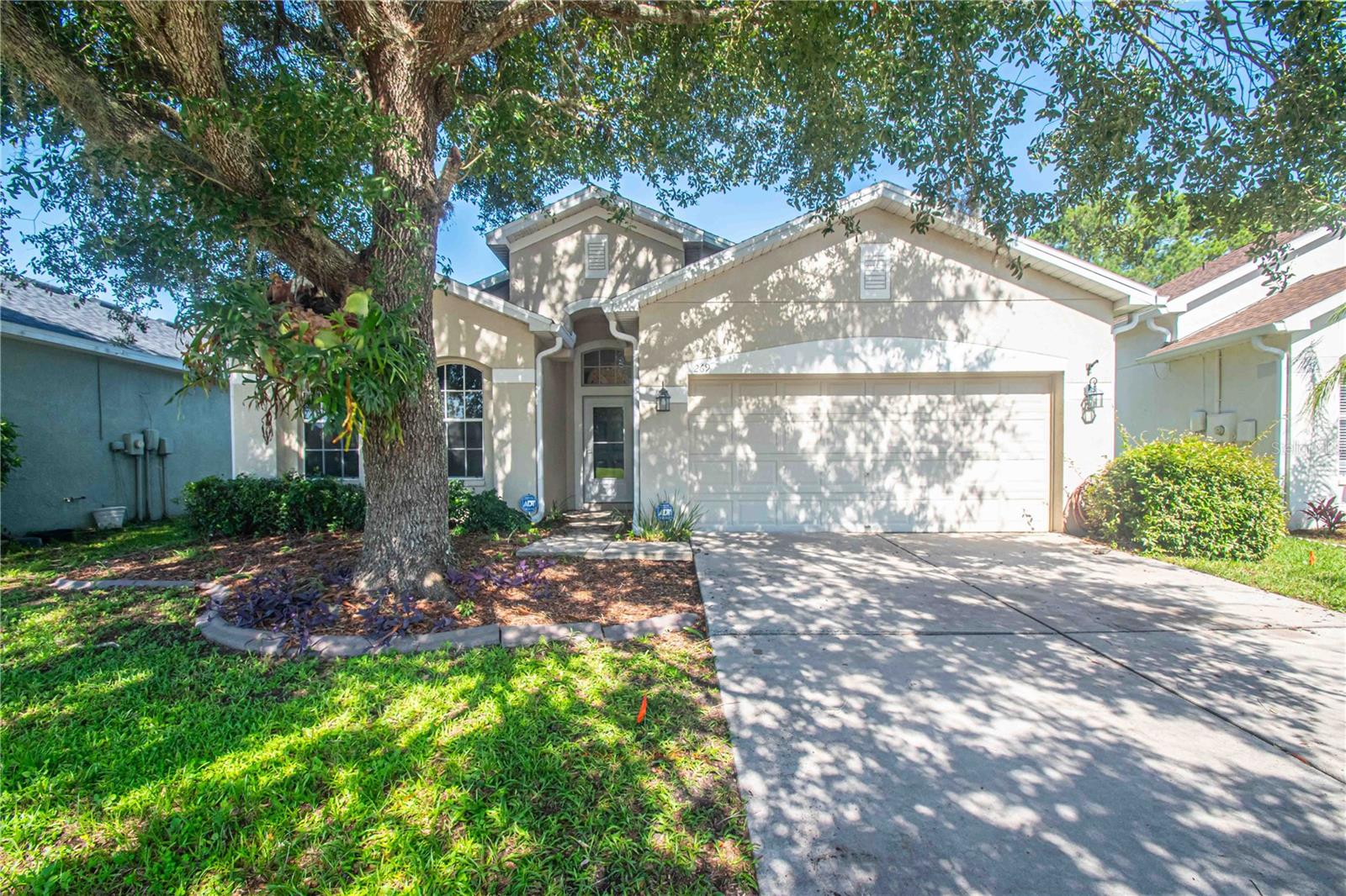 Welcome to your dream home, a beautifully maintained 3-bedroom residence with a versatile flex room perfect for a private office, guest space, or hobby area. This 2-bath, 2-car garage property features a brand-new AC system for year-round comfort and will include a brand-new roof installed at closing, offering peace of mind and long-term value. Step inside to discover an open and bright interior with a thoughtfully designed split floor plan. The island kitchen serves as the heart of the home, ideal for both everyday living and entertaining. Durable luxury vinyl plank and ceramic tile flooring flow throughout—no carpets to worry about—adding both style and ease of maintenance. The spacious master suite includes a beautifully upgraded bathroom with a relaxing garden tub and generous walk-in closets. Outside, the privacy-fenced backyard provides a peaceful retreat with a combination of covered and open patio space, perfect for enjoying the Florida sunshine. Situated on one of the larger lots in the community, this home offers extra room to spread out. The neighborhood features a low HOA dues of just 189 per quarter, which includes access to a fitness center, pool, and clubhouse. Don't miss this opportunity to enjoy comfort, convenience, and quality in a home that truly has it all.