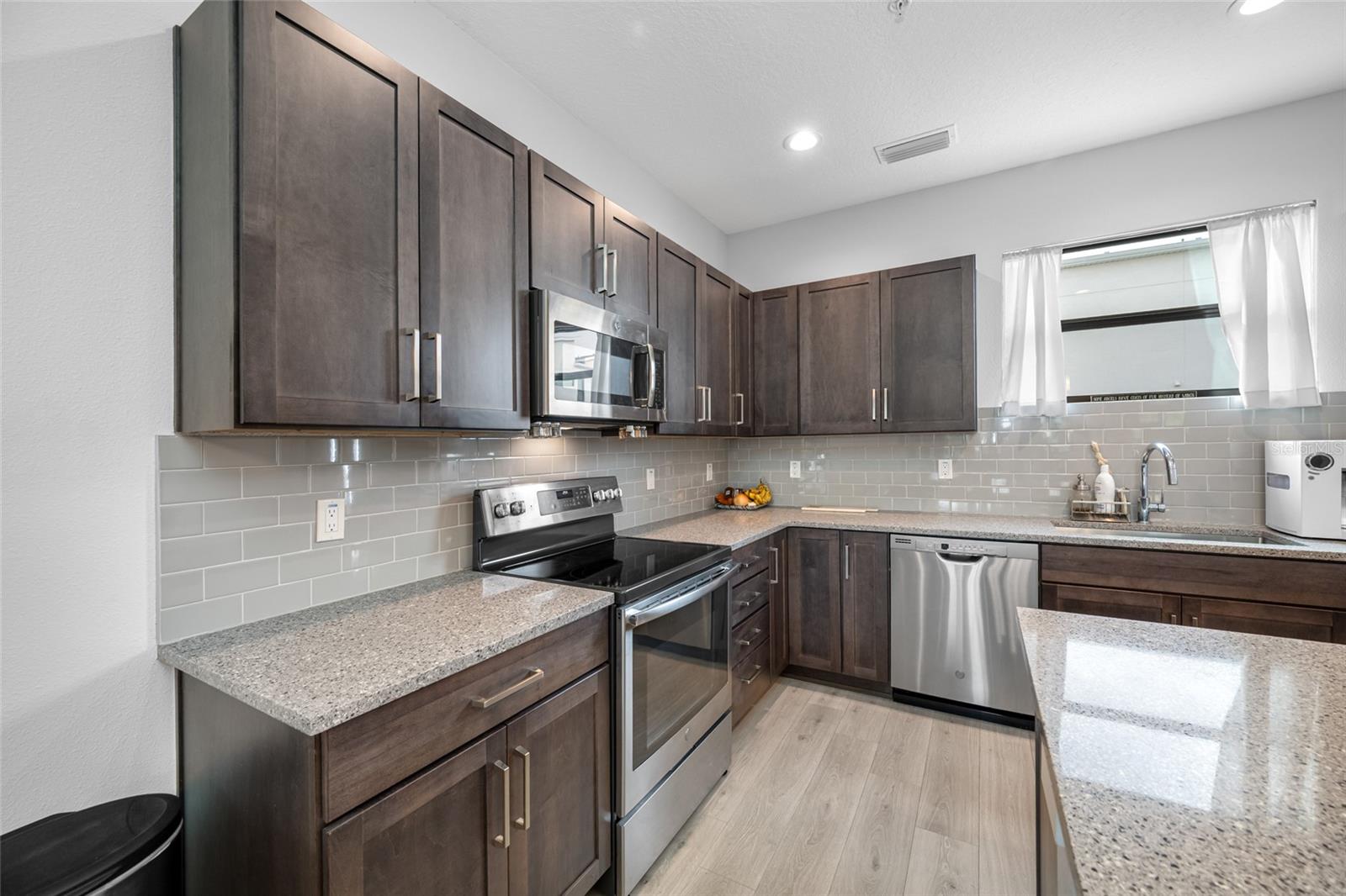 UPTOWN KENWOOD TOWNHOMES - Residential Lease
