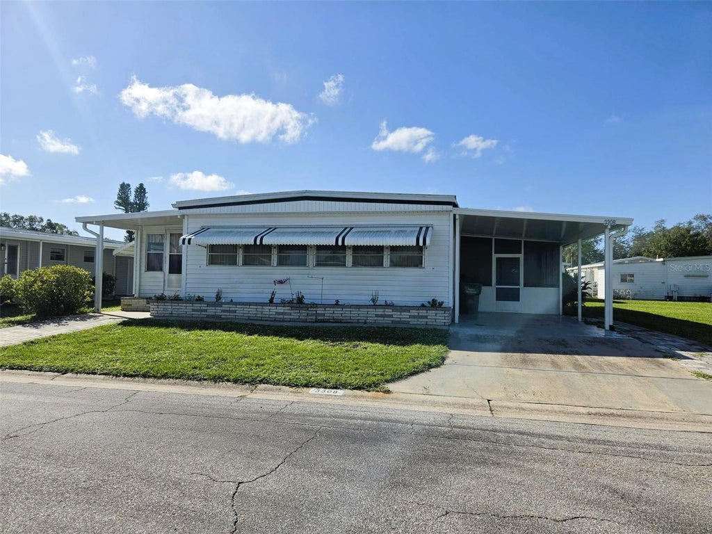 Photo of 3308 Over Cup Oak Terrace, Sarasota, FL 34237 (MLS # A4709724)