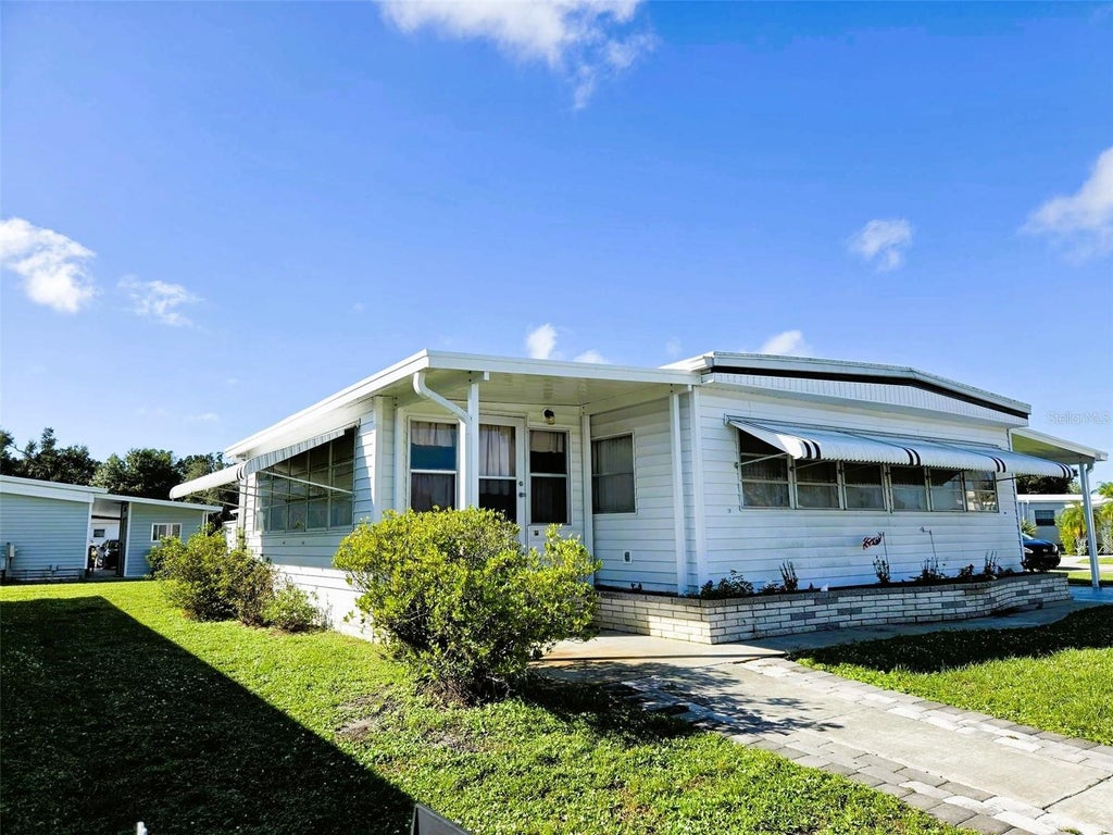 Photo of 3308 Over Cup Oak Terrace, Sarasota, FL 34237 (MLS # A4709724)
