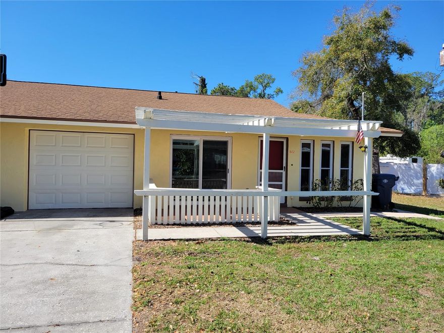 Cute Spacious updated 1/2 of a duplex in Tavares. 2 Br 1 bath w/1 car Garage & new front porch pergola. Ceramic tile floors and laminate. Freshly painted, washer and dryer hook-up in the garage Walking distance to Downtown Tavares, Wooten Park and the waterfront. NON-SMOKERS ONLY and no pets.