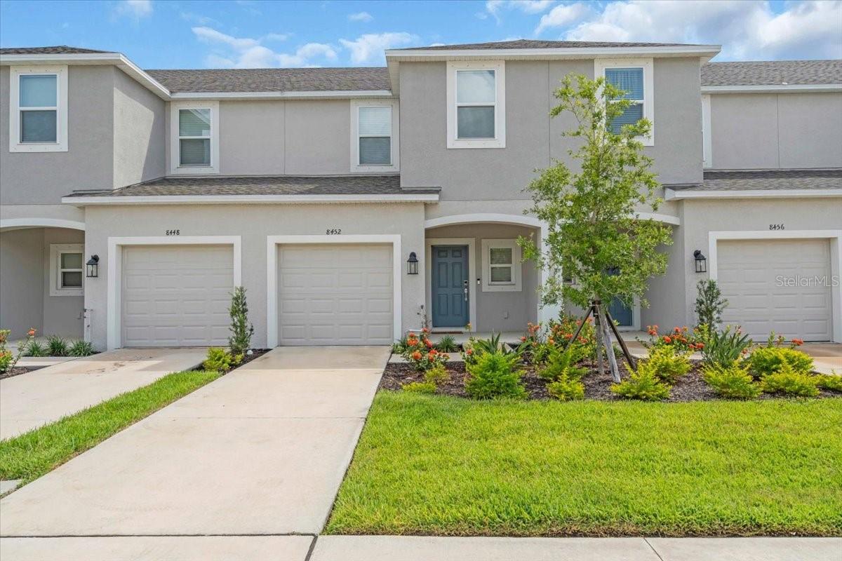 Modern Living Meets Tranquility! Welcome to this beautifully crafted 2024 Taylor Morrison Jasmine model townhome nestled in the serene Townhomes at Skye Ranch. Barely lived in and move-in ready, this elegant bright home offers: 3 spacious bedrooms and 2 stylish baths upstairs with a half bath downstairs, Laundry located upstairs for easy day-to-day living for your convenience, a 1-car attached garage with direct access. Lots of storage/ closet space. Lovely tile flooring and bright and airy open floor plan downstairs, with a huge kitchen island with gorgeous quartz countertop, great for entertaining guests. Step outside to enjoy your morning coffee in your private screened patio with a newly installed cage. There's also a water softener system added for enhanced water quality. Located just a short stroll from the pool, you'll just love this location and dog friendly community. In addition the community, offers Turner Park, lovely walking trails with pond views along the way, conveniently close to shopping, restaurants and coming soon the brand-new Skye Ranch Elementary School, opening fall 2025. This home is not in a flood zone and has no CDD bond, more savings for you. If you're looking for this specific model and don't wait for new construction to get built then you won't want to miss out on this townhome, contact me today to schedule your tour!