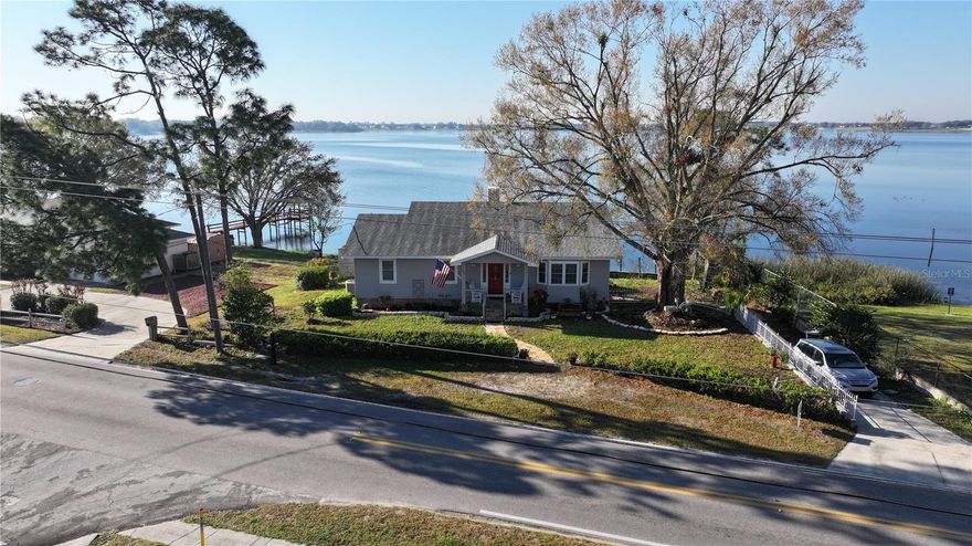 Experience the beauty and tranquility of lakefront living in this spacious 3-bedroom, 3-bathroom home with a fully finished basement on picturesque Lake McLeod. The main floor includes a spacious kitchen featuring double ovens, abundant cabinet space, and sliding doors that open to a screened balcony, perfect for enjoying the serene lake views. The dining room offers additional cabinetry for extra storage, while the inviting living room, complete with a gas fireplace, provides direct access to the balcony. The primary suite includes a walk-in closet, a beautifully remodeled en-suite bathroom, and private access to the balcony. Two additional bedrooms and a second full bathroom complete the main level. Downstairs, the expansive family/game room features a wood-burning fireplace, access to the garage and laundry room, and a third full bathroom. Sliding doors lead out to a covered patio, complete with a built-in brick gas barbecue, ideal for outdoor entertaining. The roof was newly replaced in 2020, ensuring durability and peace of mind for years to come. The backyard offers plenty of space for recreation, including a basketball/racquetball court, all set against the breathtaking backdrop of Lake McLeod. Don't miss the opportunity to own this exceptional lakefront home. Schedule your private showing today!