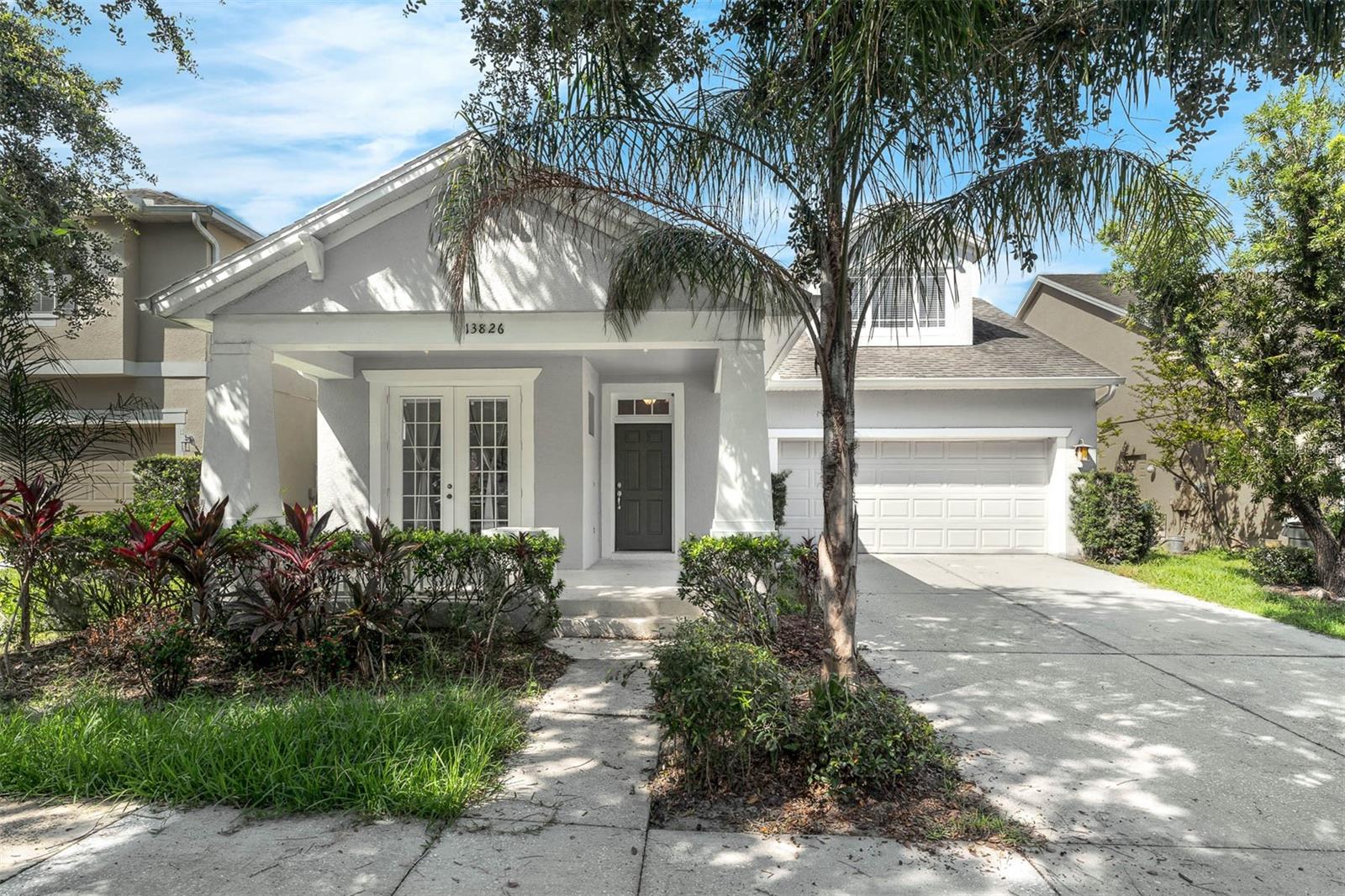 Step into the pinnacle of comfort and ease in this gated community of Eden Isle, nestled in the picturesque town of Windermere. This stunning 4-bedroom single-family home exemplifies refined living and thoughtful design at every turn. Upon entry, be greeted by the dedicated home office, seamlessly merging work and lifestyle needs for modern living. With its high ceilings, the family room exudes an open and airy ambiance, perfect for relaxation or gatherings. The main bedroom on the first floor offers a serene retreat, while the second floor unveils a unique teen suite, ideal for guests, play, or study. The heart of the home is the well-appointed kitchen, seamlessly connecting to the living area, creating a culinary haven for entertaining or everyday enjoyment. Outside, the spacious deck looks out to the fenced expansive backyard, adorned with trees, beckons you to unwind and entertain amidst nature's beauty. Eden Isle's amenities include a playground, private boat ramp, and lush parks, all with a low HOA, ensuring a hassle-free lifestyle. Best school district in centrol FL area, A-rated schools from elementaty to High school nearby elevate the appeal for families, while proximity to shops and restaurants adds to the convenience of this prime location. Welcome to your Windermere sanctuary, where every detail has been meticulously curated for a harmonious blend of comfort and sophistication. Welcome home.