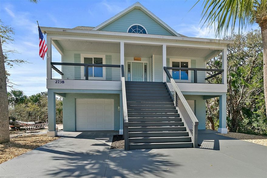 **Tropical Coastal Retreat in Flagler Beach – Where Island Living Meets Modern Comfort**
Welcome to your private slice of paradise in beautiful Flagler Beach, Florida. Nestled among swaying palm trees and majestic hammock oaks, this stunning coastal home offers the perfect blend of tropical serenity and modern upgrades—creating a lifestyle that feels like a permanent vacation.
From the moment you arrive, the inviting *8’ x 35’ front porch** and fresh exterior paint set the tone for relaxed coastal living. Step inside and discover a completely refreshed home featuring *3/4-inch Acacia hardwood flooring throughout**, complemented by **ceramic tile in the bathrooms**, giving the interior a warm yet modern beach-house feel. Every detail has been thoughtfully updated, including **all-new lighting, ceiling fans, fixtures, and faucets*, along with a *new roof installed in 2024* for peace of mind. In-House fire sprinkler system, 
The home features *two beautifully remodeled bathrooms*, showcasing modern finishes and clean coastal design. The spacious *kitchen and master bedroom are located on the second floor*, where elevated views through *new hurricane-impact windows and sliding doors* create the magical feeling of living in a treetop retreat surrounded by lush greenery.
Outdoor living is where this home truly shines. Enjoy magnificent sunsets, ocean breezes and your favorite libation from the *third-floor deck* or unwind on any of the *three expansive 8’ x 22’ balconies*, all built with a *new Trex deck system*, along with updated *exterior stairways* for easy access. Whether entertaining guests or simply soaking in the tropical atmosphere, these outdoor spaces create endless possibilities for relaxation.
Inside, the flexible floor plan includes a **7’ x 17’ office/flex room**, perfect for remote work or a creative studio. Storage is abundant with **two oversized closets totaling 367 square feet (13’ x 14’ each)**.
The **oversized garage (24’ x 58’)** is a standout feature, complete with **8-foot-tall garage doors**, an **interior staircase leading to the second floor**, and even a **full bathroom**, making it ideal for hobbyists, boat storage, or a workshop.
Step into the **huge backyard oasis**, where towering hammock oaks and tropical palms create a peaceful natural setting. With **alleyway access** and ample space, there’s plenty of room to design your dream outdoor retreat—complete with a **future swimming pool** if desired. The property also includes a **sprinkler system** to keep the lush landscaping vibrant year-round.
This home is more than a residence—it’s a coastal lifestyle. Imagine mornings on the balcony with salty ocean breezes, afternoons relaxing under palm trees, and evenings watching the sunset from your private third-floor deck.
If you’ve been dreaming of a tropical beach retreat just moments from the sand, this beautifully updated Flagler Beach home is ready to make that dream a reality.