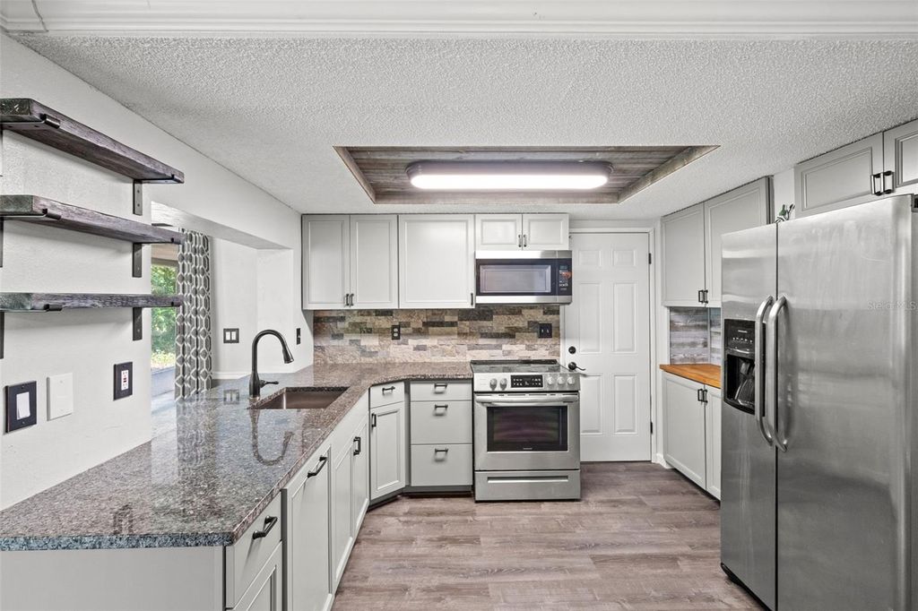 Photo of 8804 Lincolnshire Drive, Hudson, FL 34667 (MLS # W7885317)