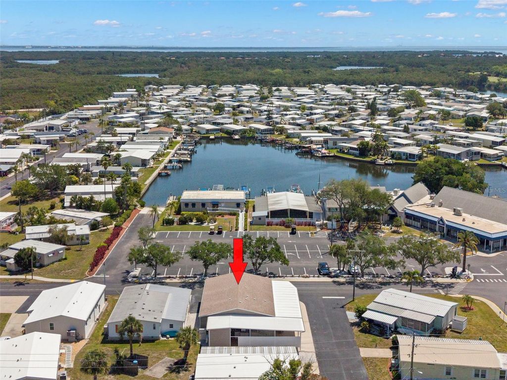 Photo of 7300 Americana Drive NE #143, St Petersburg, FL 33702 (MLS # TB8499525)