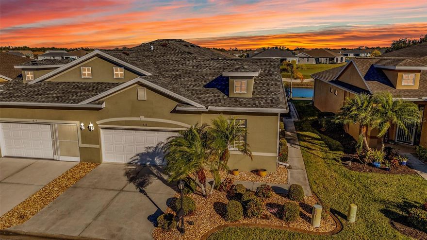 STUNNING Venetian villa with A+ view of water/pond and first hole in the gated golf course/active resort of highly desirable Kings Gate, a 55+ community that is NOT in a flood zone and does NOT require flood insurance.  Lots of updated/upgraded features in this FULLY FURNISHED villa featuring 2022 roof, 2017 AC, 2021 HWW, Impact windows - LVP flooring throughout - tiled and enclosed lanai and custom built stone façade fireplace walls (one in living room and one in lanai) add that extra touch to go along with that sensational view.  The open concept seamlessly connects the kitchen to the dining room, living room, and lanai.  Large den provides opportunity for a work area, 3rd bedroom, 2nd TV room - whatever fits your lifestyle.  And with large master bedroom in the back left of the villa and the guest bedroom in the front right of the villa both you and your guests will have plenty of privacy.   And with the extra 1/2 bath -  your guests can have their own private bathroom.  Good size laundry room and additional cabinets.  Plenty of places to relax and/or entertain in this villa - and no question you're going to love having your morning cup of coffee and/or your favorite after dinner drink in the lanai over looking the water/pond and the serenity it provides. And if you haven't been to Kings Gate before - you're going to love the options for activity (Olympic size heated swimming pool and spa, tennis courts, pickle ball, lawn bowling, shuffle board, bocce, horseshoes, gym, billiards, library, euchre, bingo, bridge, Texas hold em, poker, mahjong and more).  The onsite AND NEWLY REMODELED Lions Den restaurant and bar is super convenient and also offers Tuesday night Karaoke and monthly trivia contests. Many residents love the fact that they are just a golf cart ride away from the shopping plaza that provides you access to grocery store (ALDI), drug store, bank, restaurants and shopping.  Want to explore outside of Kings Gate – you are minutes away from the restaurants and shops of downtown Punta Gorda and Fisherman's village. And if you want to explore more of Florida's fun spots you’re near I75 to quickly head north or south. An AWESOME villa with one of the very best views in all of Kings Gates to go along with custom stone fireplace walls in a PREMIER gated community needs to be seen in person to be appreciated/understood.  Call today for a private showing and a golf cart tour of the community/amenities.