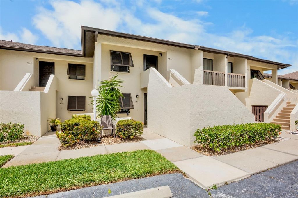 Photo of 4623 Longwater Chase #112 Bldg J, Sarasota, FL 34235 (MLS # A4689212)