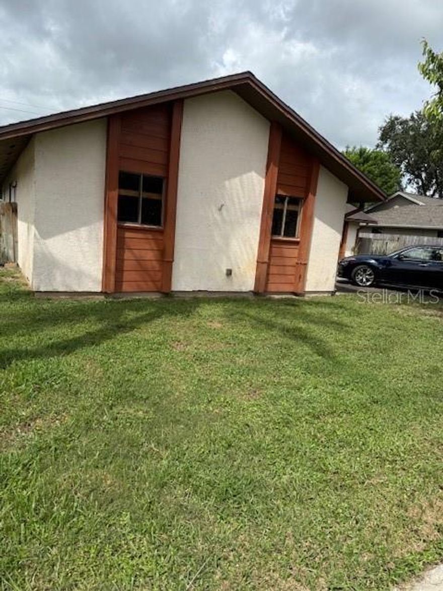 "Open the Doors to Your Dreams" of investing is a home that you can customize the way you like it. This 3 bedroom 2 bath home
has extra rooms to be used as you desire. It features a Kitchen that is open to the Family Room; Kitchen also feature granite countertops. 
This home would be great for the investor types or the first time home buyers that don't mind building some "sweat equity". The primary
bathroom is waiting for you to add a fancy shower. The entire interior of the home is looking forward to your choice of colors you will select for painting. And all the floorings throughout the house are waiting for your selections. Will you choose laminate, wood, tile, or plush carpet. You will design and customize. You will most likely add new kitchen appliances and maybe even replace some kitchen cabinets.  You will get the opportunity to add your personal style and touch. You will turn this house into a home. The outside of the home could use pressure washing. But most likely you will choose to paint it. I consider this the "classic ugly house" in a good neighborhood that investors are taught to look for. And the low price makes this "as is" house a value buy. Come see it today. At this low price it will not last long. The house has a big front yard and a large fenced in back yard.