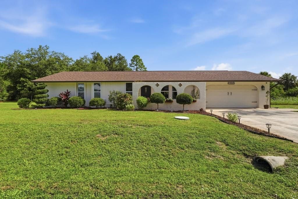 Photo of 15562 Maynard Avenue, Port Charlotte, FL 33953 (MLS # C7528466)