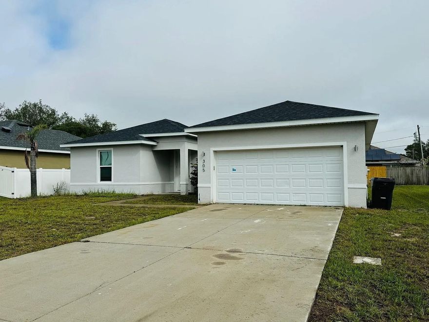 elcome to 305 Hibiscus Dr, Poinciana, FL, a beautiful newer construction home built in 2019 offering modern design, comfort, and a functional layout. This well-maintained property features 3 bedrooms, 2 bathrooms, and 1,590 sq ft of living space, making it ideal for comfortable everyday living.

The home features a bright open floor plan that connects the living room, dining area, and kitchen, creating a spacious environment perfect for gatherings and daily activities. Large windows provide plenty of natural light, giving the home a warm and welcoming feel.

The kitchen offers ample cabinet space and a practical layout, making meal preparation easy while staying connected to the main living area. The primary bedroom suite provides a relaxing private retreat with its own bathroom and generous closet space.

Two additional bedrooms provide flexibility for guests, family members, or a home office. The home also includes central heating and air conditioning for year-round comfort and a 2-car garage for convenient parking and storage.

Located in the Poinciana area of Central Florida, the home is close to shopping, schools, parks, and major roadways, providing convenient access to everyday amenities while maintaining a quiet residential setting.