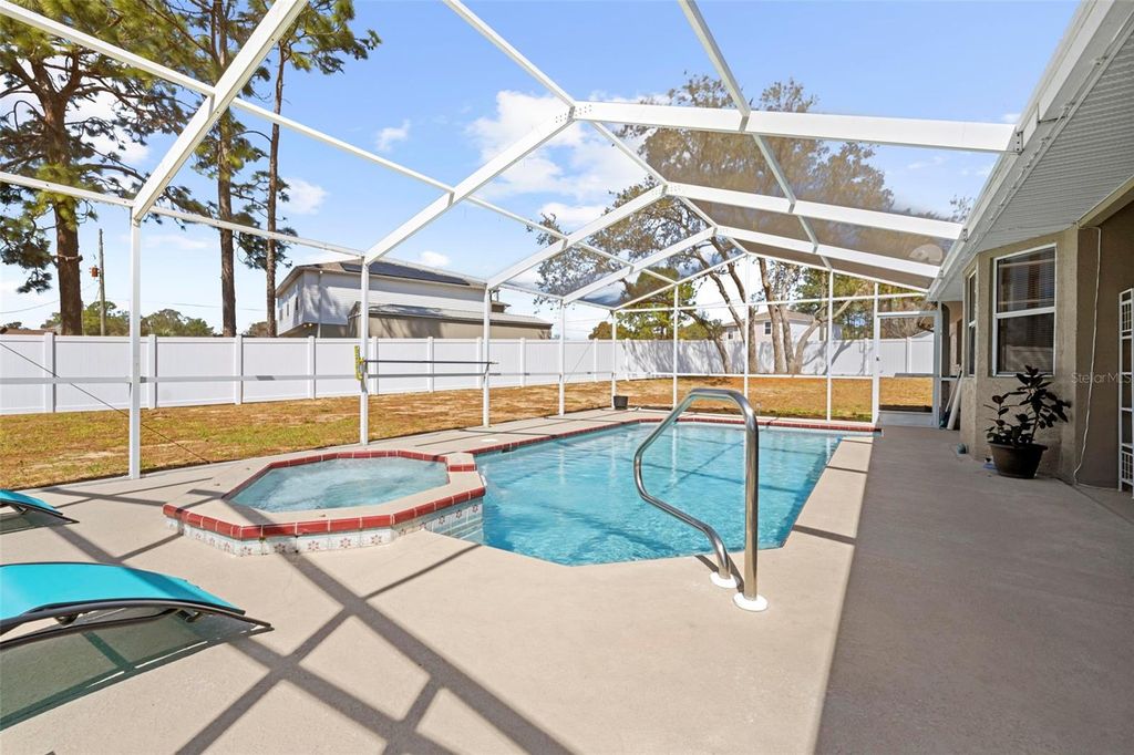 Photo of 4351 Castle Avenue, Spring Hill, FL 34609 (MLS # W7883621)