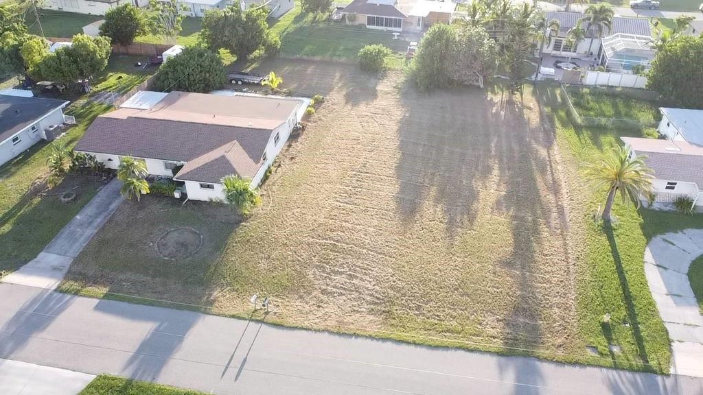 Photo of 156 Francis Drive NE, Port Charlotte, FL 33952 (MLS # O6367426)