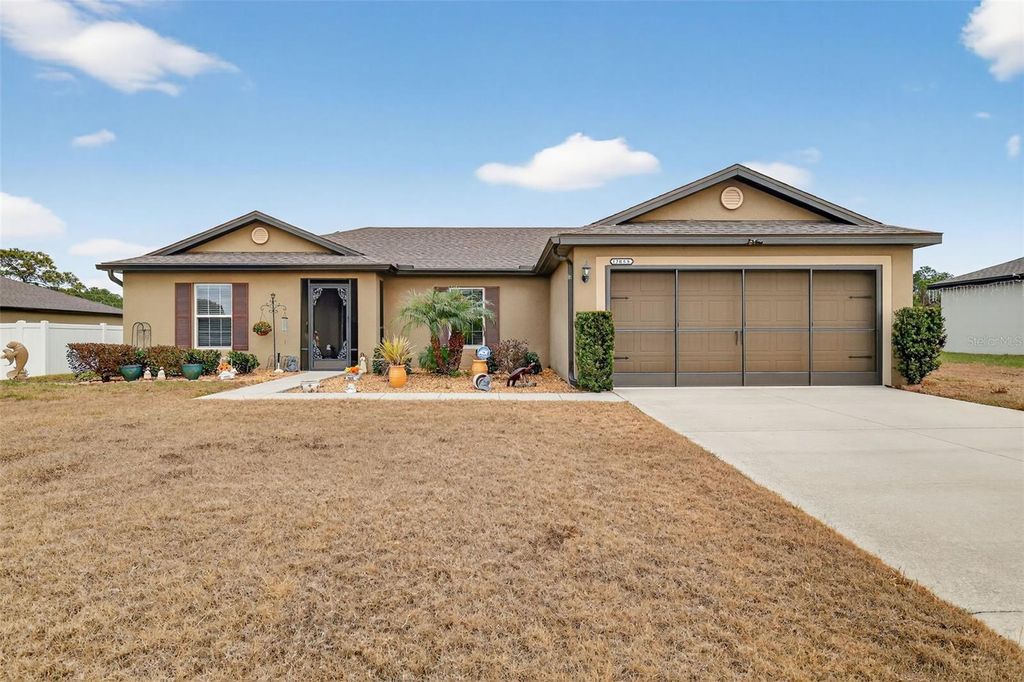 Photo of 12058 Callicarpa Lane, Leesburg, FL 34788 (MLS # G5107550)