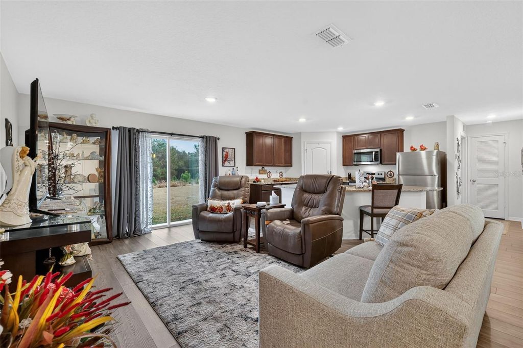 Photo of 12058 Callicarpa Lane, Leesburg, FL 34788 (MLS # G5107550)