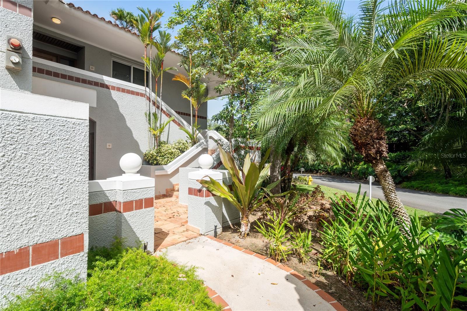 This beautifully furnished and fully equipped residence is located on a second floor in a private and exclusive community, The Greens, that offers a blend of tropical elegance, modern comfort and resort-style living. The unit features two spacious bedrooms, two and a half renovated bathrooms, and an updated kitchen with modern finishes. Large windows fill the space with natural light, and the balcony offers stunning views of the golf course.
The rental includes two assigned outdoor parking spaces, a golf cart garage, and a power generator for added convenience. While it comes fully furnished, please note that some art pieces will be removed prior to occupancy.
As a resident, you’ll enjoy access to the community’s private amenities, including a residents-only pool, tennis court, and visitor parking. In addition, the rental offers you the opportunity to apply for membership to enjoy full access to the Resort’s impressive amenities, such as the Sports Hub with pickleball and tennis courts, basketball, a state-of-the-art fitness center, and more.
Ready for move-in starting mid-August. This is a rare opportunity to experience resort living in a tranquil and well-maintained setting.