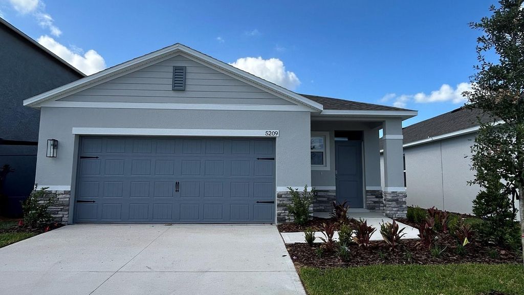 Photo of 5209 Native Mile Loop, Davenport, FL 33837 (MLS # O6409653)