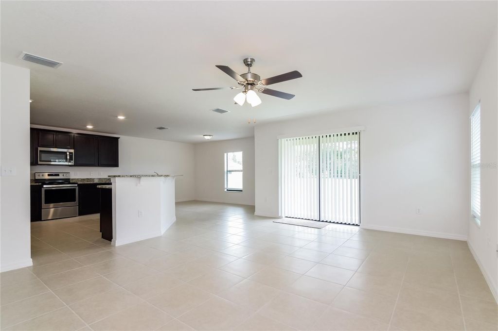 Photo of 8512 Silverbell Loop, Brooksville, FL 34613 (MLS # O6378642)
