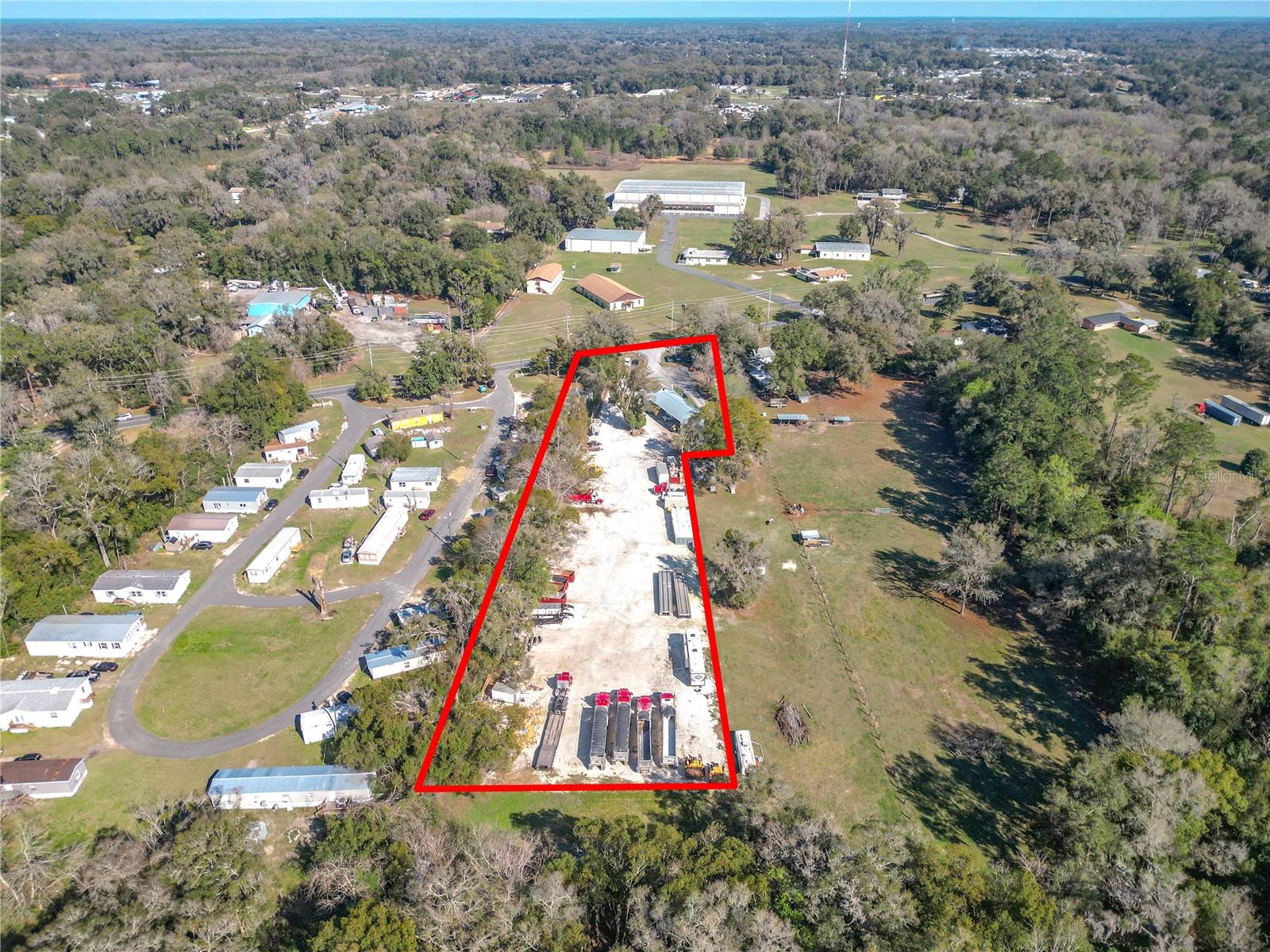 DRASTIC PRICE REDUCTION!! THIS IS A DEAL! INVESTORS WELCOME.
FROM 775K TO NOW 599K!
Need a turn Key ready comercial property to get down to business quickly? This offering is complete with huge storage/parking yard, and plenty of office space. Large 28'X58' 4 bay maintenance garage with lift, 3 RV hook ups, Gated with newer perimeter fencing, 1500 gallon total diesel tanks with high flow pump, flexible zoning location, approximately one acre in rear cleared and complete lime rock base for parking, storage yard, etc. (Asphalt ready if so desired) Asphalt in all other areas. Some owner financing available with agreeable terms. This property won't last, so set your appointment to see it today!