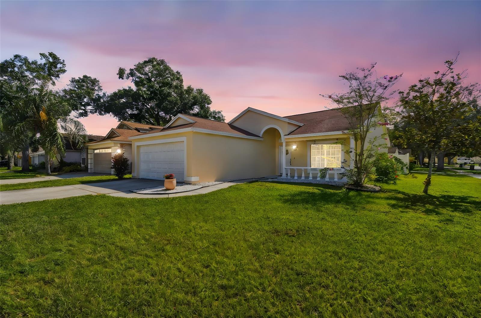 Located in the heart of Citrus Park, this beautifully updated 3-bedroom, 2-bath, 2-car garage home is tucked away on a quiet cul-de-sac street, offering added peace, privacy, and a more serene setting in a community of fewer than 100 homes within the highly rated Sickles High School district. Featuring a bright, open layout with high ceilings and a flexible floor plan that easily adapts to your lifestyle, the home offers a spacious family room and a stunning new Shaker-style kitchen with sparkling quartz countertops, stainless steel appliances, and a breakfast bar. Large windows throughout the home fill the space with natural light, complemented by new laminate flooring through out which adds warmth and modern style. The master suite boasts a large walk-in closet and a fully renovated tiled bathroom with dual sinks and a walk-in shower, while the secondary bedrooms share a modern bath at the front of the home. Enjoy indoor laundry, a screened-in patio, shed, and a vinyl-fenced backyard. Roof 2016, A/C 2014, and water heater 2020. Ideally located near the Veterans Expressway, Upper Tampa Bay Trail, top dining, Citrus Park Mall, Tampa Airport, and close to beautiful Clearwater beach—this home offers comfort, flexibility, and style in a prime location. Call for a private showing today! or enjoy a virtual reality tour here https://my.matterport.com/show/?m=ePtBJNDLo89&brand=0