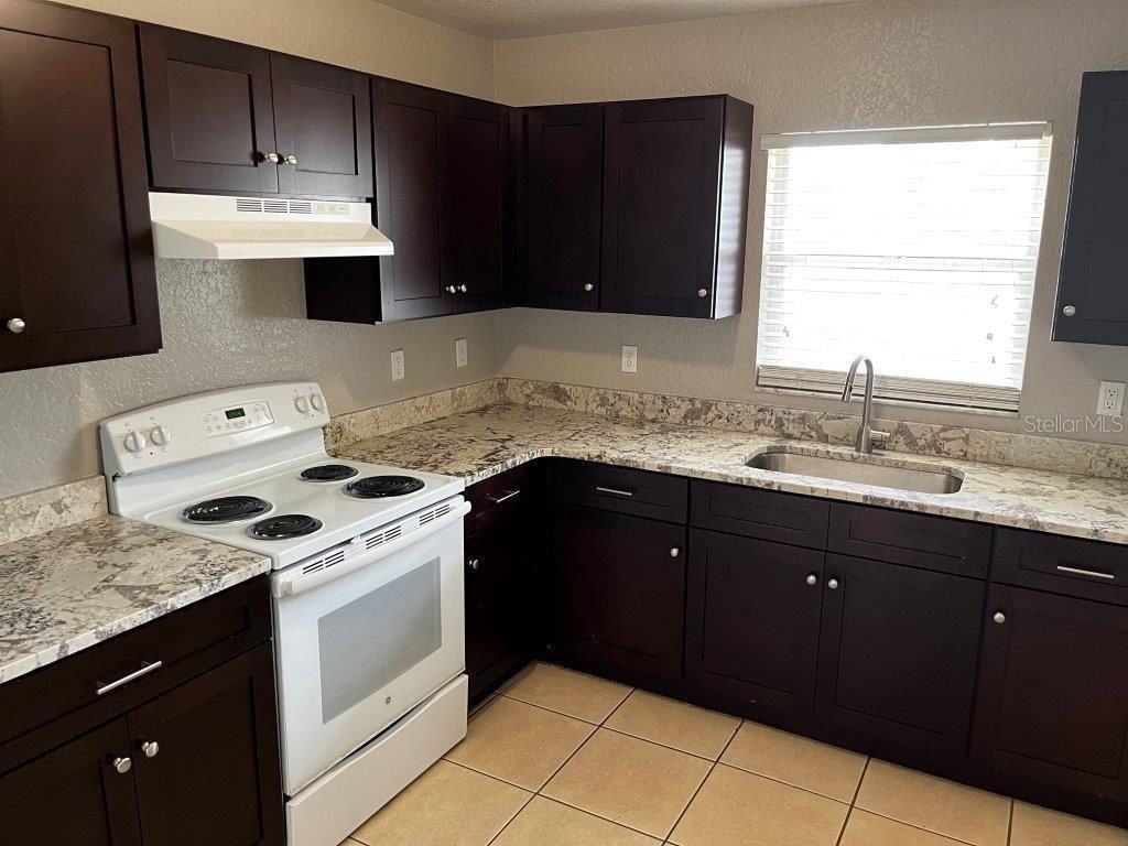 Photo of 354 Pearlwood Street, Orlando, FL 32811 (MLS # O6398556)