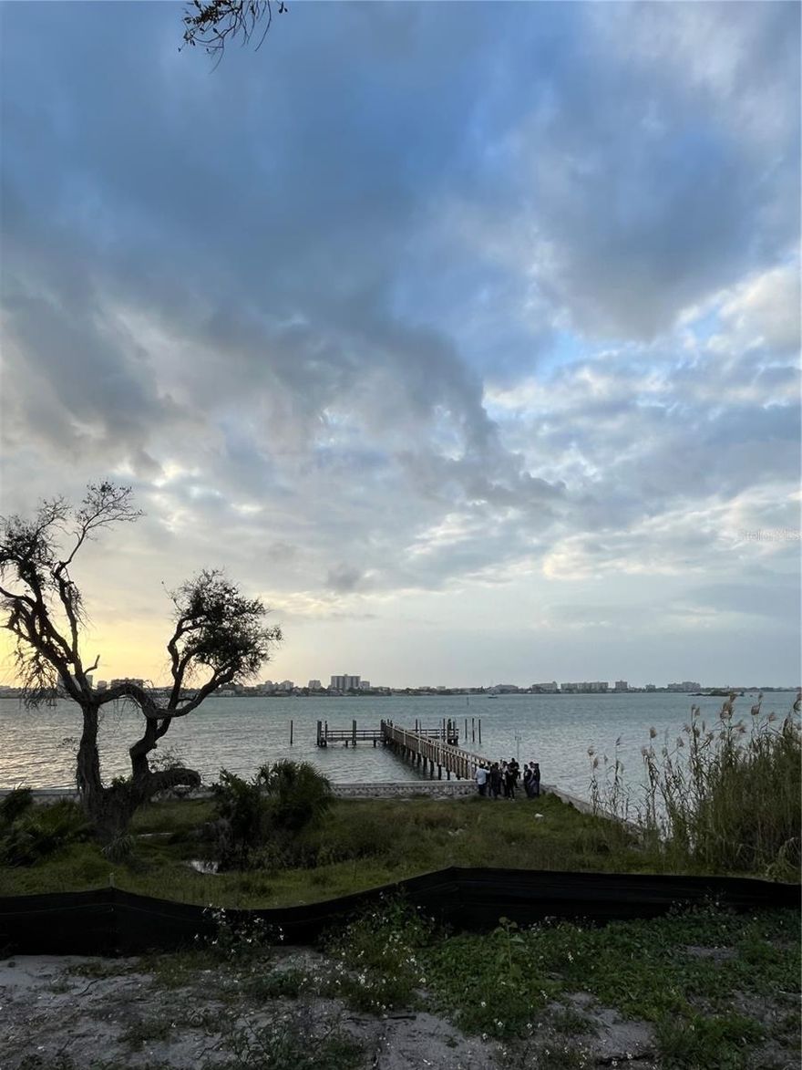 Waterfront land in Clearwater!! Two acre property subdivided into eight parcels with approved plans for eight single-family homes of approximately 2500 to 4000 sq ft each. Great waterfront access with a dock and seawall already in place. Very near shopping centers, great restaurants and beautiful beaches. The new Ruth Eckerd Hall Venue and education center is just blocks away. Ready to develop !!!