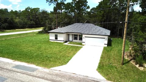 Photo of 7420 N Voyager Street, Citrus Springs, FL 34433 (MLS # W7878312)