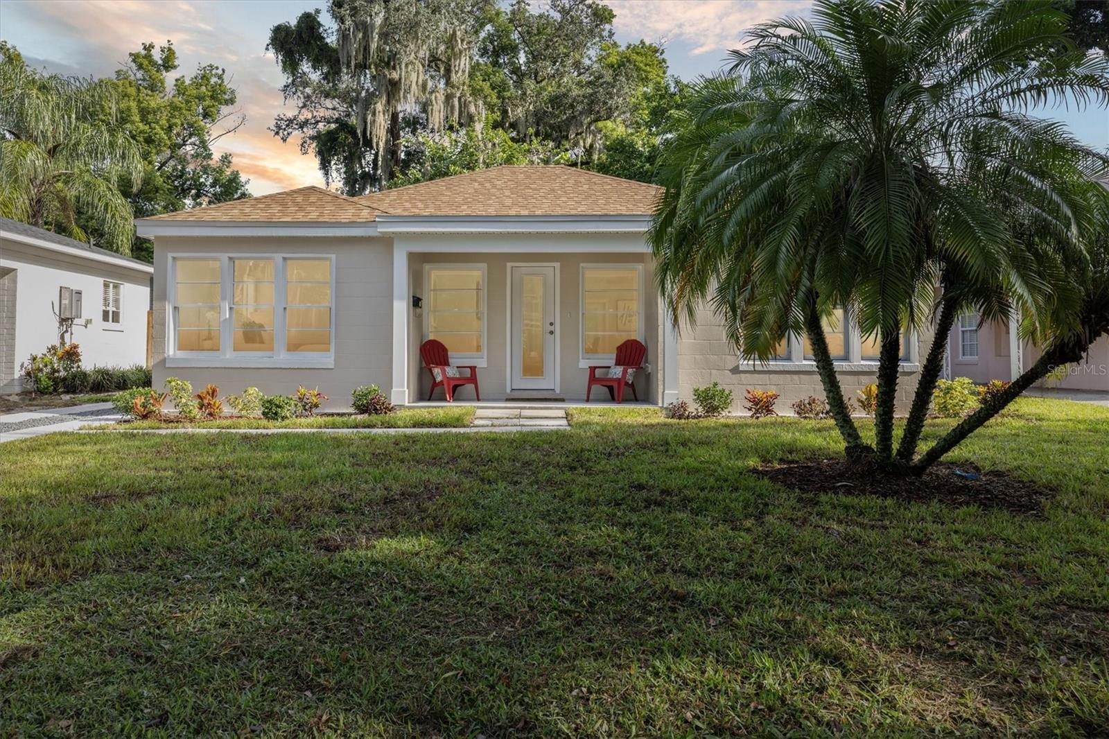 LOCATION LOCATION LOCATION! In the heart of Thornton Park on an historic brick paver street welcome to your newly remodeled sanctuary! Step inside this fully remodeled home, where every detail has been thoughtfully designed and upgraded for modern comfort and efficiency. The beautiful windows and the natural light is breathtaking! The interior has been completely rebuilt from the studs out, featuring brand-new framing, drywall, fresh paint, updated electrical, plumbing, and a new HVAC system. A new roof with CertainTeed Architectural shingles comes with a 25-year manufacturer warranty and 7-year workmanship warranty.
Enjoy the durability and beauty of Lifeproof Dusk Cherry waterproof luxury vinyl plank flooring throughout, paired with energy-efficient JELD-WEN W-5500 windows with SunResist HeatSave technology. The gourmet kitchen is equipped with premium LG stainless steel appliances, quartz countertops, tile backsplash, and high-quality cabinetry with dovetail wood drawers and soft-close finishes.
Additional features include recessed LED lighting, fans with remote controls, new energy-efficient insulation, a tankless EcoSmart water heater, and a 4-zone mini-split AC system for customizable comfort. Outdoors, you’ll find fresh exterior paint, a new driveway, updated landscaping, and a mature starfruit tree that produces twice a year.
This home combines high-end finishes with practical upgrades, and right in the heart of Thornton Park with easy access to everything you love about DTO from the Farmer's markets and events around Lake Eola to theatre at Dr. Phillips center of performing arts and beyond.