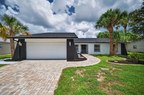 Photo of 10221 Landmark Drive, Hudson, FL 34667 (MLS # W7887003)