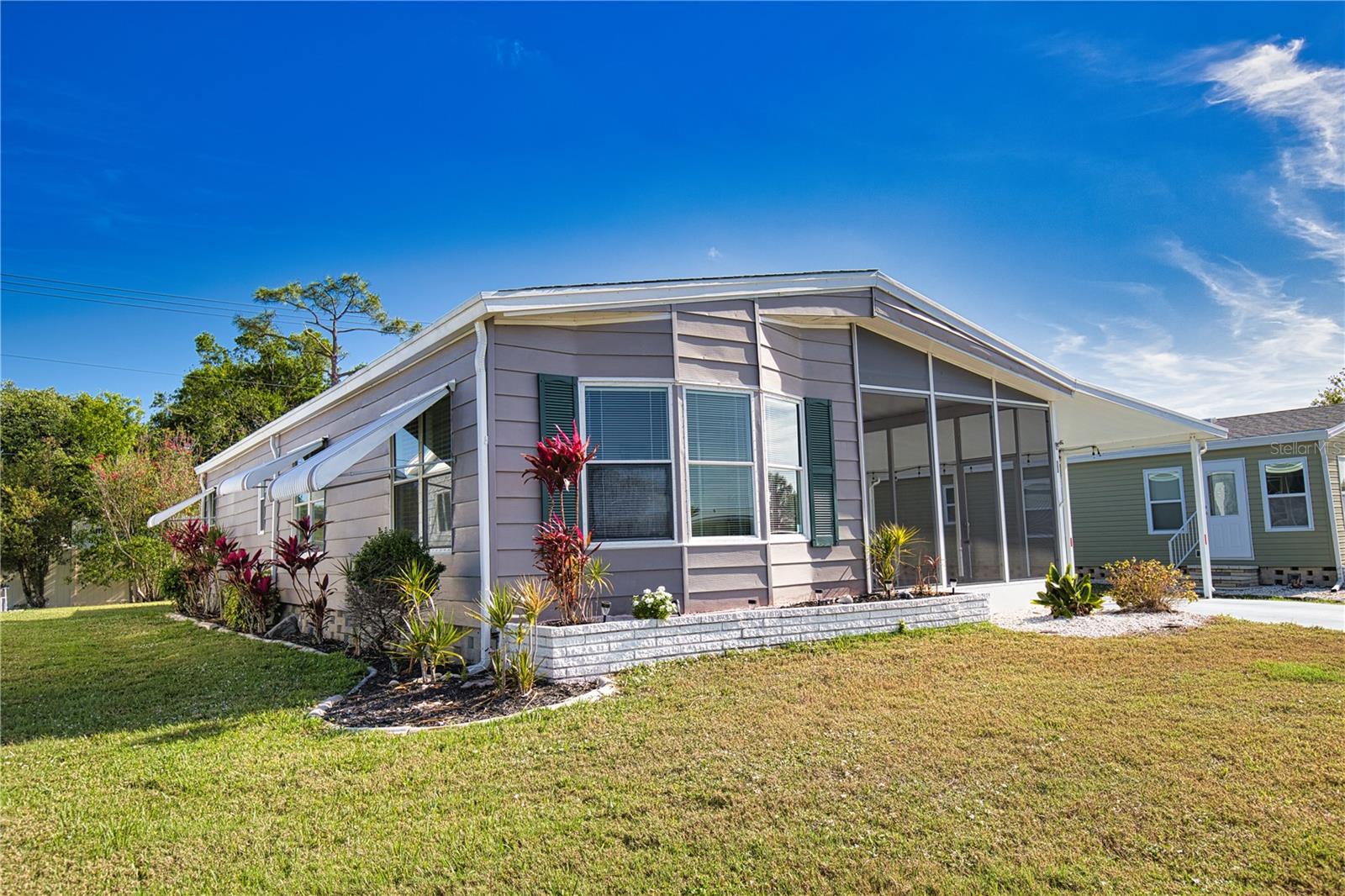 This exquisite home embodies the essence of Florida living at its finest! Tucked away on a serene street in a vibrant 55+ community, this is your golden opportunity to embrace the Florida dream. The delightful kitchen and dining area flow seamlessly into a spacious living room, creating a perfect setting for entertaining friends and family. Step into the inviting living room, where you'll find a charming den that can easily serve as an office, craft room, or even an additional sleeping space for guests. The expansive primary bedroom is a true retreat, featuring a luxurious ensuite bathroom with a generous walk-in closet and an updated bathroom showcasing a walk-in shower for your comfort. Your guests will feel right at home in the cozy second bedroom, which boasts a lovely slider that opens to a sun-drenched Florida Room, offering serene views of the private backyard. Throughout the home, beautiful wainscoting accents add a touch of charm, creating a warm and inviting cottage atmosphere. Don't miss this chance to make this enchanting home your own! Discover the enchanting community of La Casa, where 974 stunning homes are elegantly nestled among a tapestry of native trees, offering a serene escape surrounded by spacious common areas and eight picturesque lakes. Our generous lots average an impressive 60 by 80 feet, providing ample space for your dream home. Perfectly situated between Sarasota and Fort Myers, La Casa embodies the ultimate lifestyle on Florida’s Gulf Coast—a true boaters paradise with direct access to the breathtaking Gulf of Mexico. Enjoy the convenience of nearby shopping, exciting sightseeing, world-class golfing, and abundant fishing and boating opportunities, all while indulging in the rich culture and refined elegance that Southwest Florida is celebrated for. As you immerse yourself in the warmth of Southwest Florida’s winters, you’ll find yourself in a relaxed and unhurried atmosphere, far removed from the hustle and bustle of the east coast. Our community is adorned with lush, mature landscaping that reflects the loving care both residents and management dedicate to preserving its beauty. At La Casa, you’ll discover some of the finest pools in the area. Our crowning jewel is a magnificent 40 by 60-foot swimming pool, maintained at a perfectly inviting 87 degrees. Just a short stroll away, you’ll find our cozy 20 by 40-foot pool, nestled charmingly between the clubhouse and the Activity Building. Both pools feature adjacent hot tubs, ideal for unwinding after a refreshing day of golf or an invigorating game of tennis. Stay connected while basking in the sun with our complimentary wireless Internet (Wi-Fi), available at the Clubhouse, Activity Building, and Recreation Hall. Whether you’re catching some rays or catching up on emails, La Casa has it all. Does this sound appealing? La Casa is not just a community; it’s a welcoming family-friendly haven.