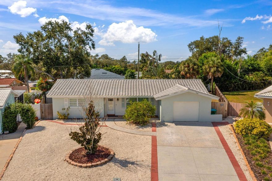 One or more photos have been virtually staged. Located on a quiet cul-de-sac in the sought-after Williamsdale Square community, this charming single-story home offers an ideal blend of comfort, style, and convenience. With 2 bedrooms, 2 full baths, 1 car garage, and 1,311 square feet of living space, this home delivers thoughtfully designed living in an unbeatable location. A brand new concrete tile roof was installed August of this year, as well as new stucco and a fresh paint job on the exterior. As you walk inside, you’ll notice the beautiful wood-look tile covering the floor. The kitchen is every home chef’s dream, boasting a natural gas cooktop, built-in wall oven, and a full-sized refrigerator plus a two-drawer under-counter unit for extra food and beverage storage. Unwind in the screened-in enclosed patio, ideal for morning coffee or evening relaxation. The primary bathroom features a double vanity, travertine tile, and a refinished bathtub, while the second bathroom includes a newly installed shower pan. The natural gas water heater and furnace provide excellent energy efficiency. Perfectly located near everything you love: a day at the beach, an evening enjoying the downtown St. Pete nightlife, get all your
shopping done at Seminole City Center, and less than a mile from the Bay Pines VA Medical Center. This home makes everyday living and weekend fun a breeze. Call today to schedule a private tour!