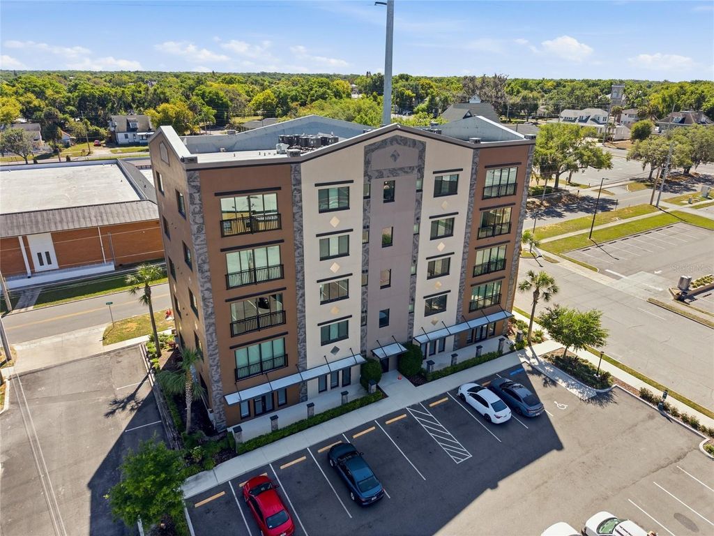 Photo of 100 N Dewey Street, Eustis, FL 32726 (MLS # O6396643)