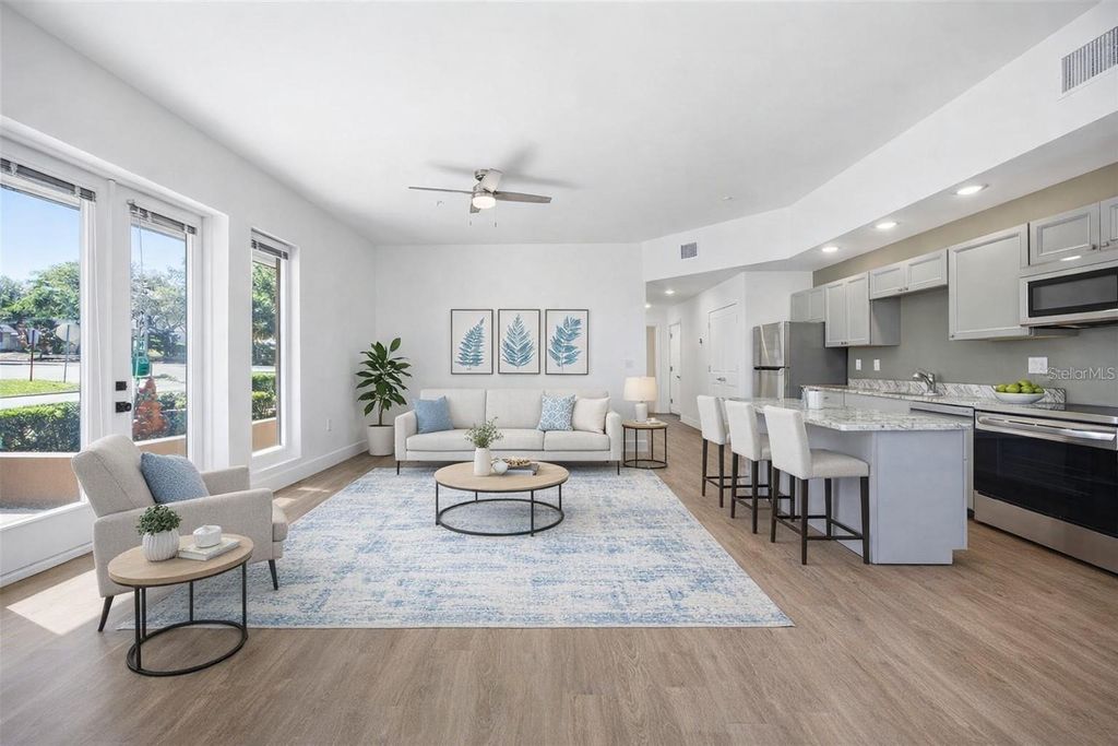 Photo of 100 N Dewey Street, Eustis, FL 32726 (MLS # O6396643)