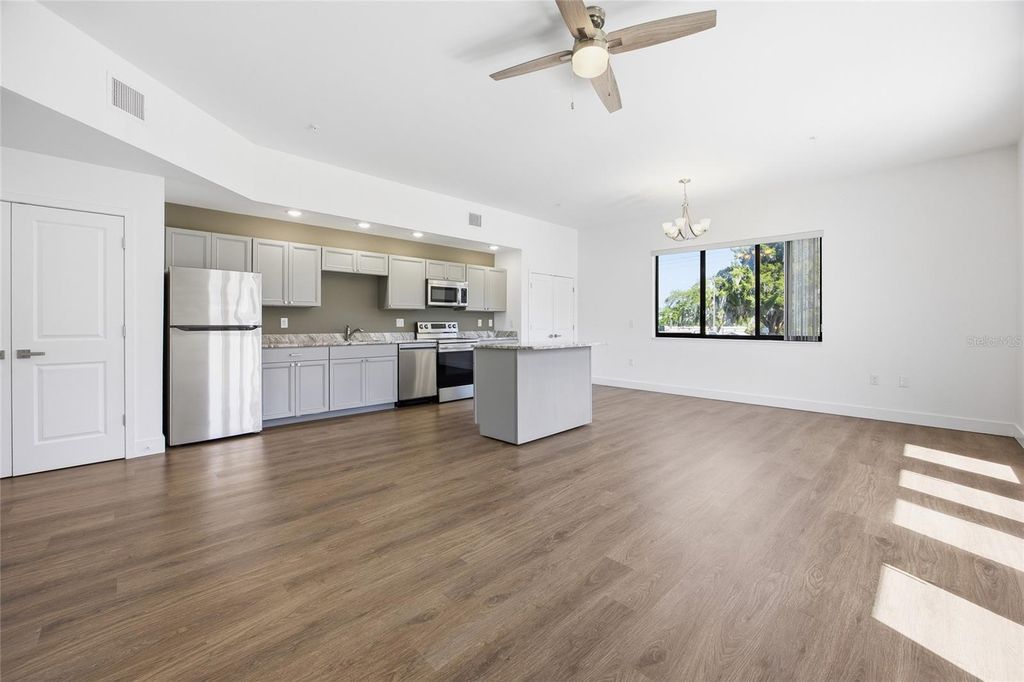 Photo of 100 N Dewey Street, Eustis, FL 32726 (MLS # O6396643)