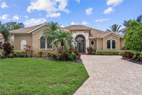 Photo of 7058 Vilamoura Place, Lakewood Ranch, FL 34202 (MLS # A4704672)