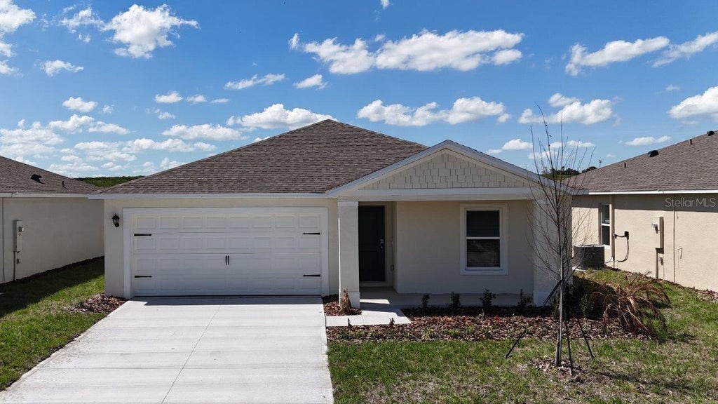 Photo of 1721 Grandiose Drive, Haines City, FL 33844 (MLS # O6413549)