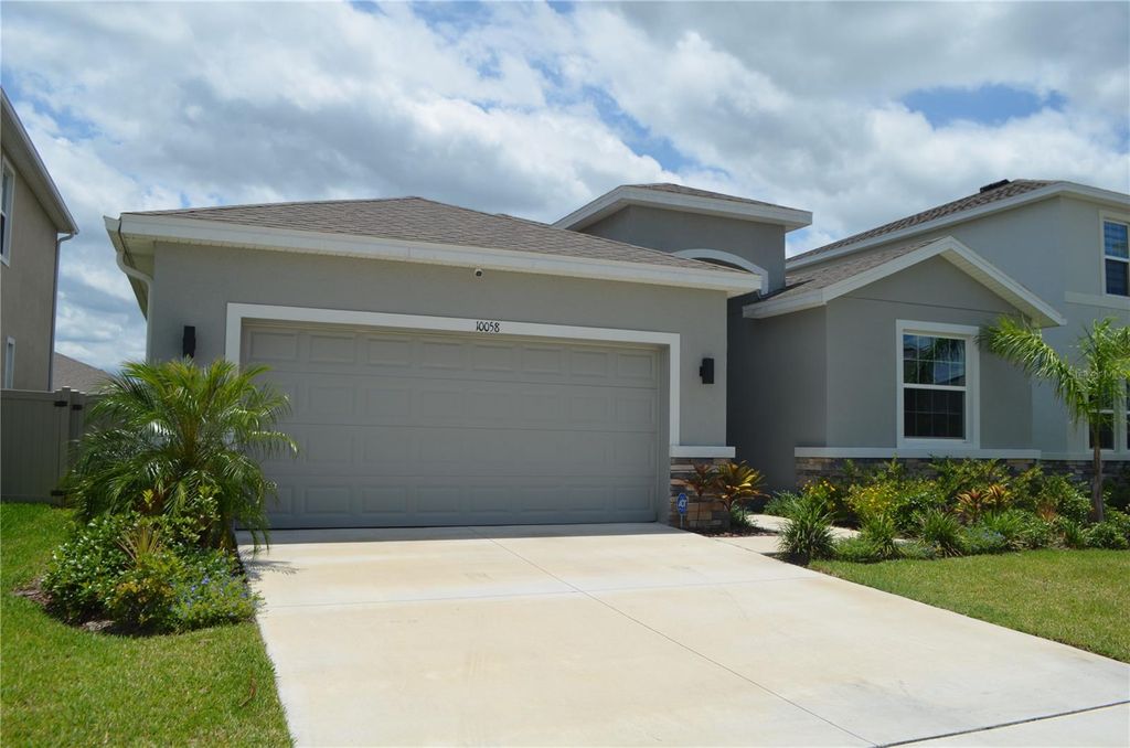 Photo of 10058 Shoreline View Way, Wesley Chapel, FL 33545 (MLS # TB8329796)