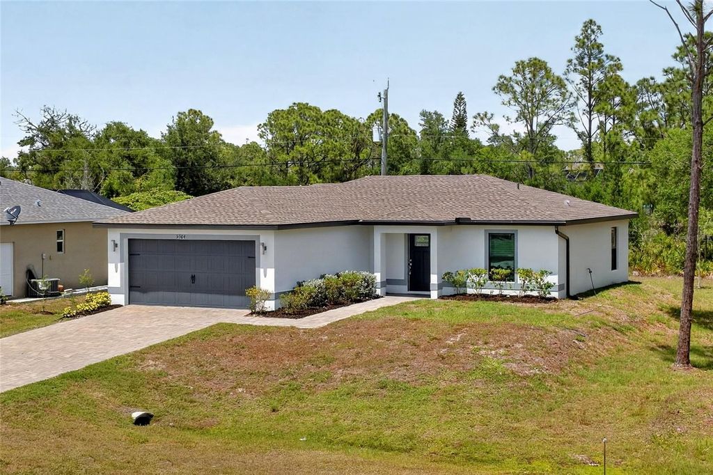 Photo of 5384 Gillot Boulevard, Port Charlotte, FL 33981 (MLS # C7525654)