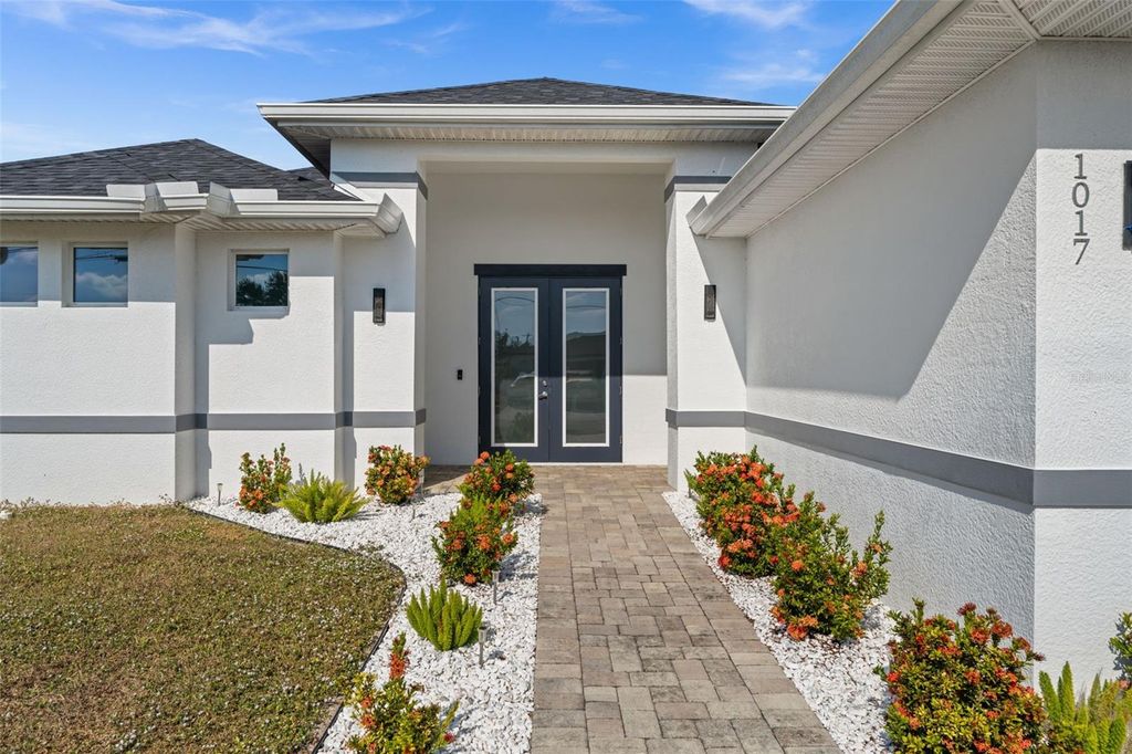 Photo of 1017 NW 15th Terrace, Cape Coral, FL 33993 (MLS # TB8479008)