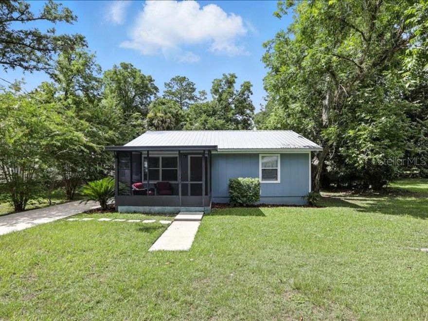 *Back on Market: *Buyers Loan Denied* Adorable Downtown Newberry Home. Two bedroom/1 bathroom home in historic downtown Newberry--completely renovated & turn-key ready. Renovated with style and quality in mind including new metal roof, new windows, new luxury vinyl plank flooring, freshly painted interior & exterior, new kitchen with stone counters & wood cabinets and new appliances,  and new Hardie siding. New hot water heater. Luxury vinyl plank floors and new porcelain tile flooring. No carpet in home. Bright and cheerful in all rooms. 
This home is situated on a quiet downtown Newberry street  within walking distance to the post office and all your favorite Newberry shoppes & restaurants. Plenty of room for a garden on this quarter of an acre lot (.24). Quaint front door to enjoy your morning coffee. Home shows like a vintage cottage but was constructed in 1995! Eligible for VA, FHA and USDA.