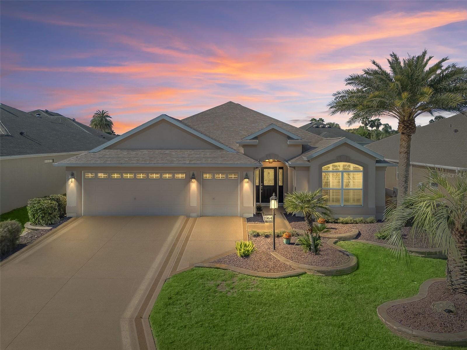 Beautiful Iris Model in The Village of Pennecamp. Conveniently located near Lake Sumter Landing, Cane Garden Country Club, the Pennecamp mail station, and a nearby adult pool, this well-maintained 3-bedroom, 2-bath home offers both comfort and convenience. Step inside to discover a thoughtfully designed layout featuring an enclosed lanai under air—perfect for year-round enjoyment. The kitchen is outfitted with granite countertops, upgraded stainless steel appliances, and plenty of cabinetry for storage. Additional highlights include a built-in office and Murphy bed in the front guest bedroom, a newer roof (2022), and a newer hot water tank (2018). This home offers a wonderful opportunity to enjoy The Villages lifestyle with move-in-ready comfort. Let’s get you living the dream in The Villages.