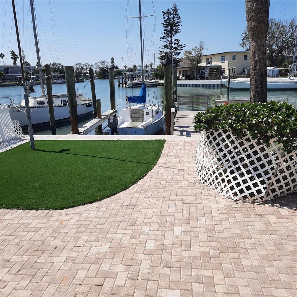 Photo of 319 Boca Ciega Dr, Madeira Beach, FL 33708 (MLS # TB8385319)