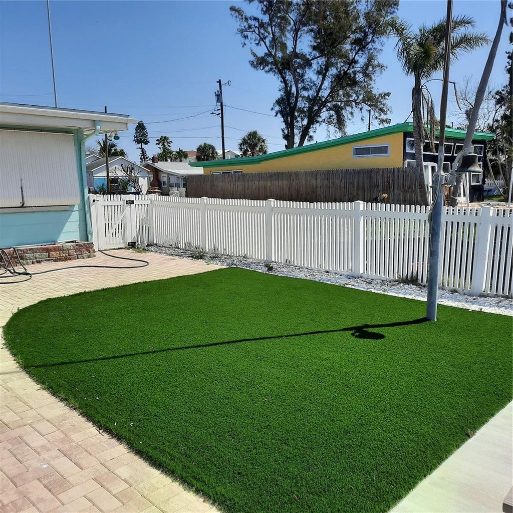 Photo of 319 Boca Ciega Dr, Madeira Beach, FL 33708 (MLS # TB8385319)